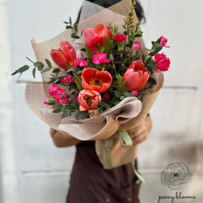 Bright and cheerful orange tulip bouquet